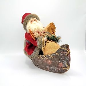 Vintage Santa Claus Figurine Riding In a Rustic Canoe w/ Presents